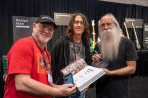 Bill and Dave with legendary bassist Leland Sklar (of Phil Collins and much more) at the 2024 NAMM Show in the Dingwall Guitars booth.