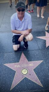 Bill with Phil Collins star on the Hollywood Walk of Fame